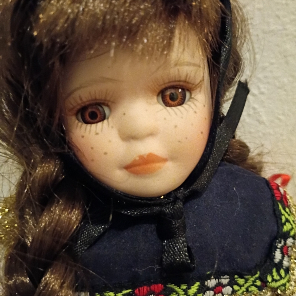 Porcelain Doll with Brown Hair and Blue Dress